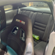 Old cloth rear seat. Originally grey, the previous owner dyed them black to match the buckets